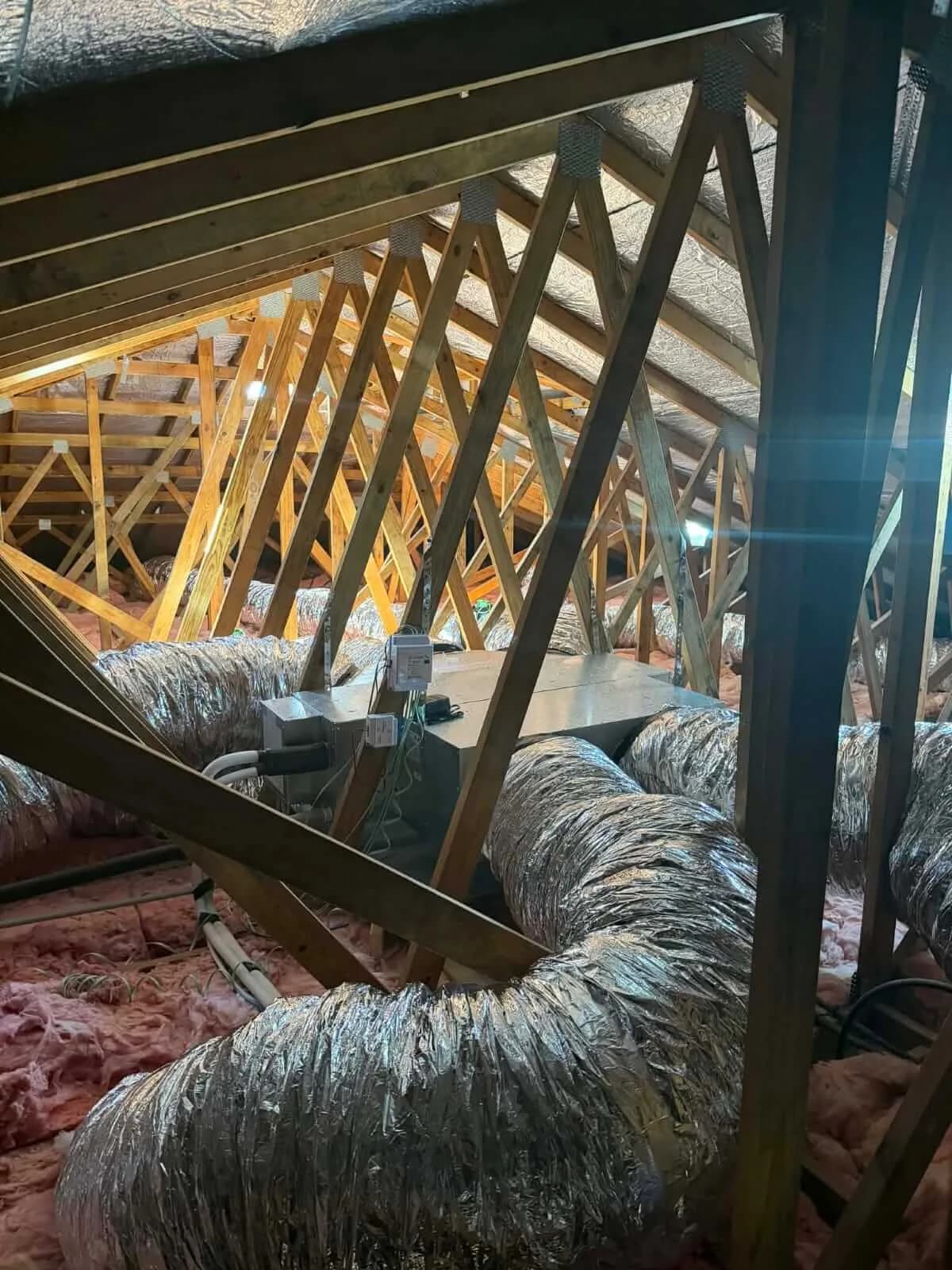 Flexible ducting run through the roof space of a Brisbane home during a ducted install